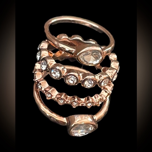 Stackable rose gold tone rings size 7 Can wear 1 or all 4 together! Super cute. - Picture 2 of 2